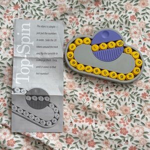 Top Spin Puzzle Game - Yellow and Gray